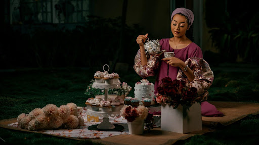 Romanticizing your life. Woman enjoying tea and her well designed life.